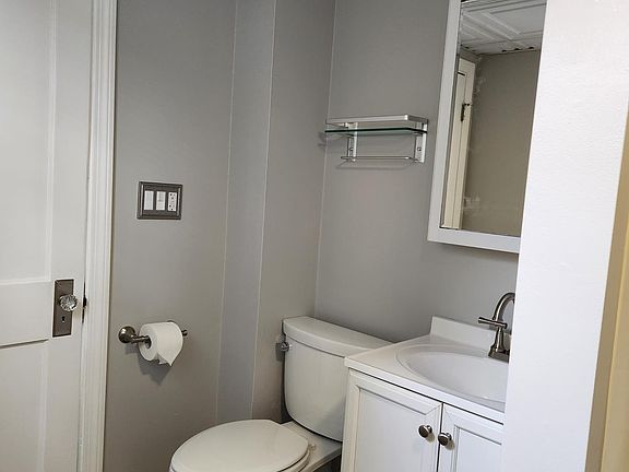Large full bathroom with brushed nickel accessories