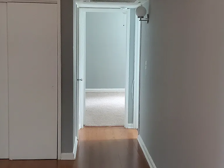 Living room to bathroom and bedroom