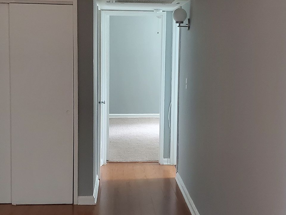 Living room to bathroom and bedroom