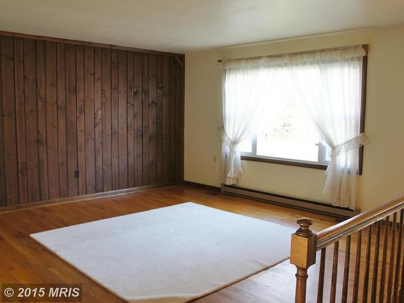 Wood wall has drywall behind, so easily removed!