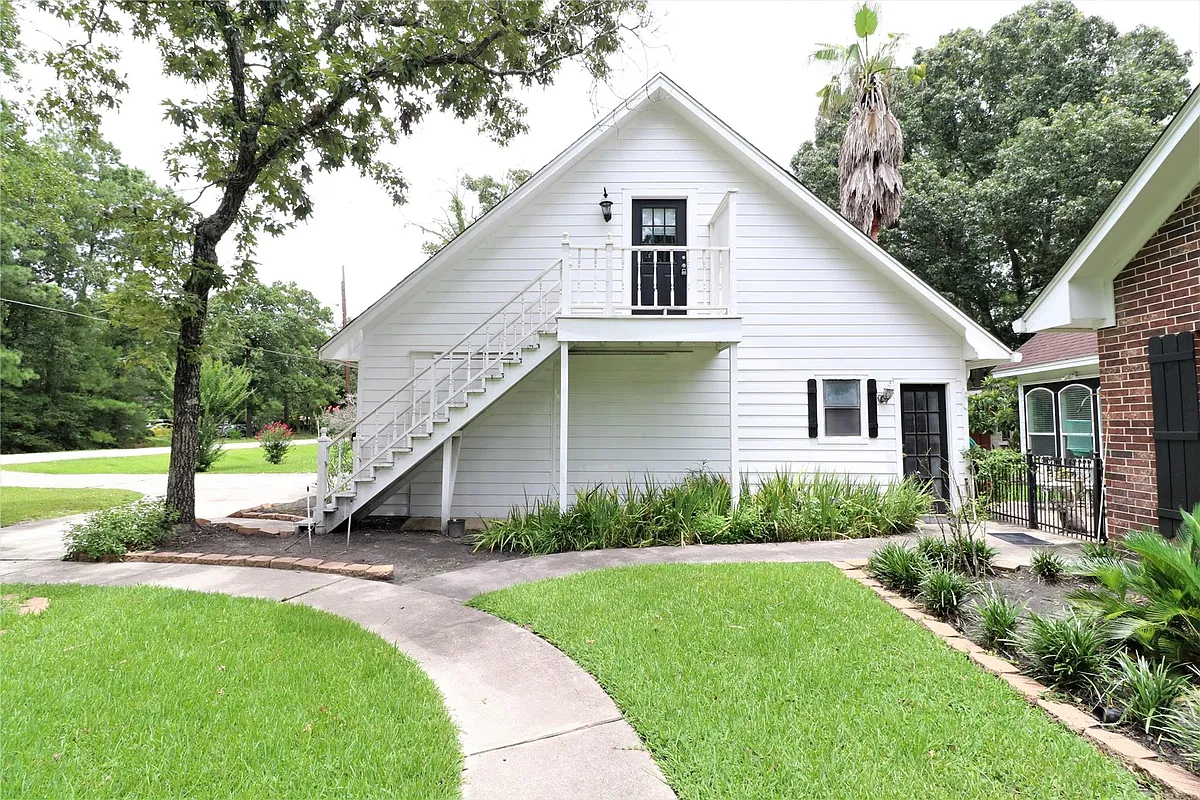 Photo 1 of 13 - 1702 Cougar Creek St - Conroe, TX Primary Photo - 1702 Cougar Creek St