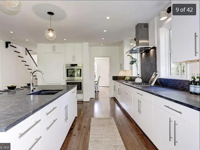 Modern kitchen with stainless steel appliances and ample storage