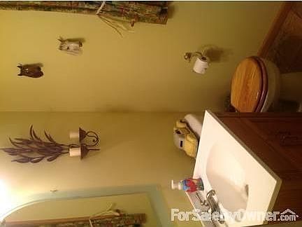 Lower 1/2 bath
						:
						Off the Foyer