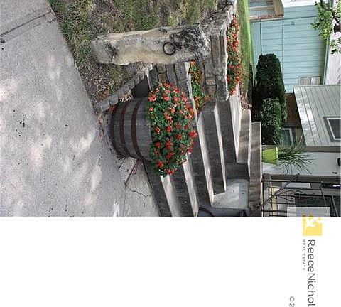 Beautiful landscaping awaits your arrival.