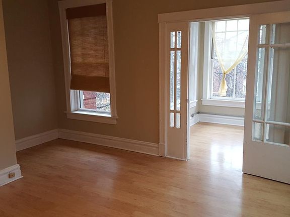 Bedroom looking into sunroom