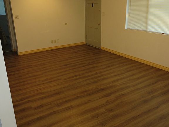 Brand new flooring in living room, very easy to clean.