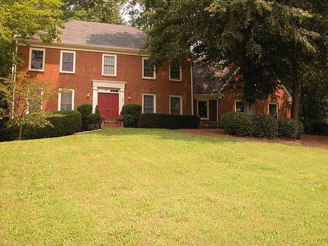 Beautiful brick-front home in a cul-de-sac backing up to Nat'l Forest Land.