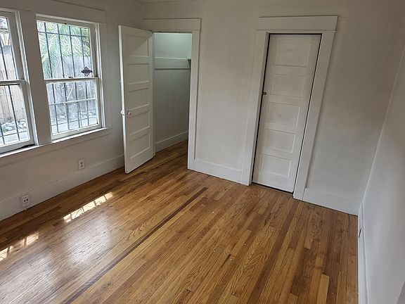 2nd bedroom with ceiling fan