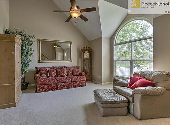 The Living Room is quite spacious and offers a large window with arched glass to let the natural light shine in.