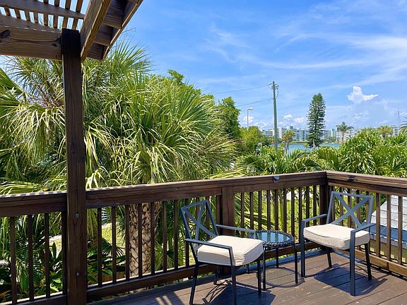 Unit 2 Private deck and entrance with partial bay view