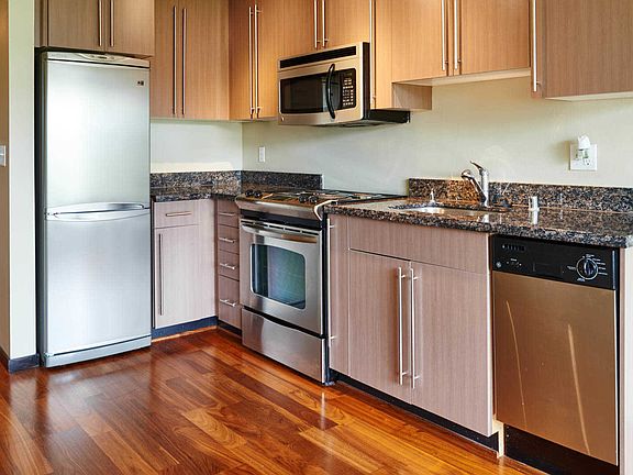 Kitchen with Granite Countertops and Stainless Steel Appliances