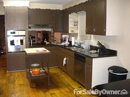 Completely Refinished Kitchen : Granite counter tops, Rough hewn floors, stainless appliances.
