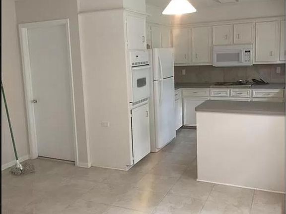 Garage entrance and kitchen