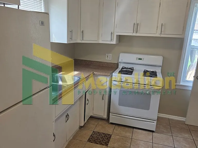11004 S Eberhart Ave — Photo 14