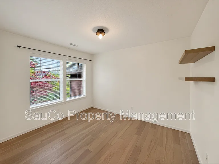 7399 NE Stonewater St — Photo 25