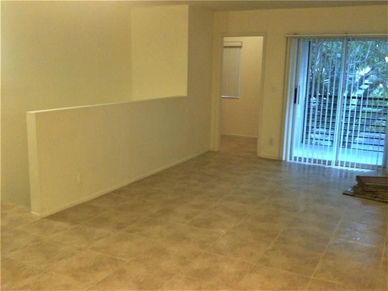 1st image of 300 Gardens Dr APT 203