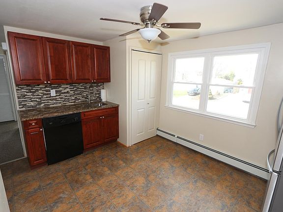 Granite tops, eat in kitchen, cherry cabinets, lots of light
