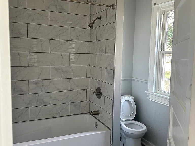 Upstairs show/tub and toilet