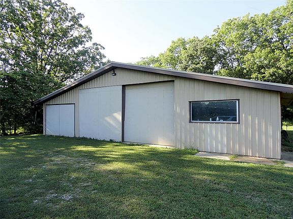 Large 50 by 40 garage/workshop.