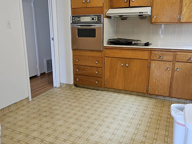 Kitchen (with electric stove top and newly installed vent)