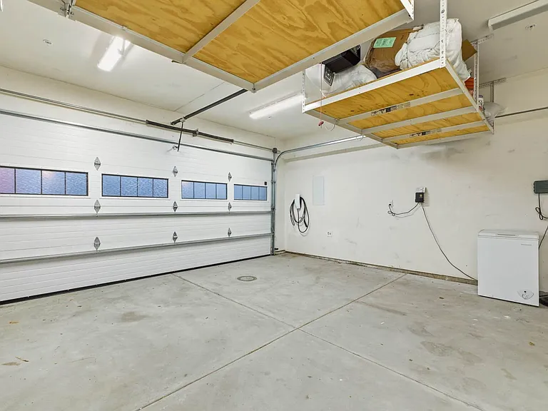 garage with tesla charger