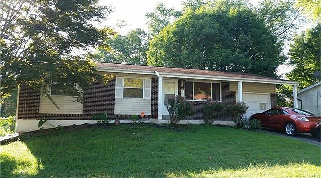 Brick and vinyl, one car garage, nicely updated home with large fenced back yard!