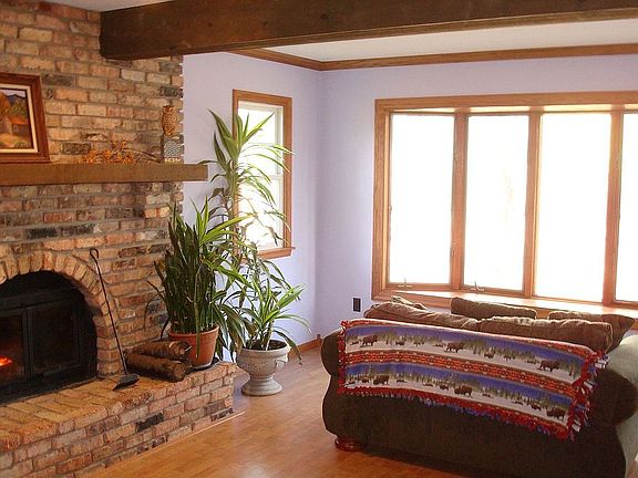 Family room with fireplace and bay window