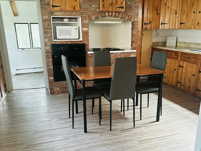 Eat-in Kitchen with view to First Floor Laundry Room