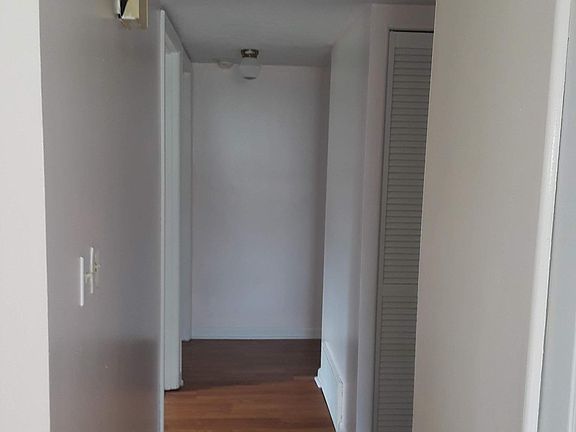 Hall leading to bedrooms and bathroom