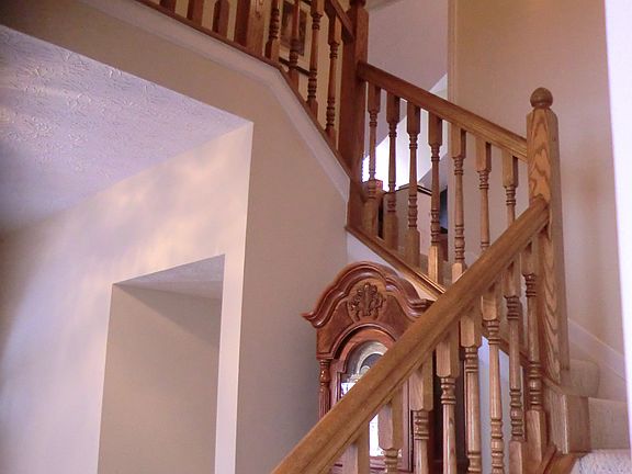 Beautiful Oak Banister graces the front entry.