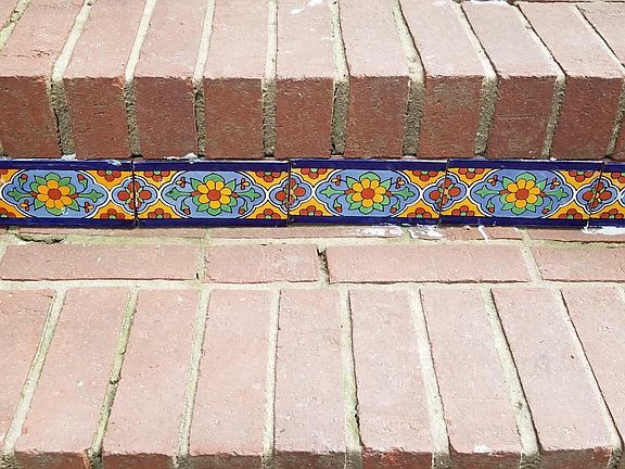 Decorated front steps. One of many hidden colors in the house.