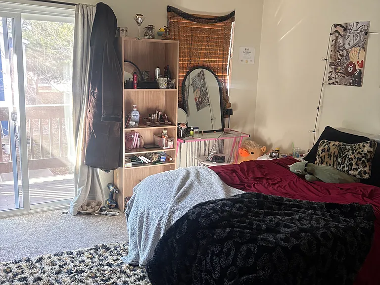 Upstairs bedroom with balcony