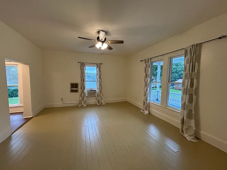 Large and bright living room - freshly painted top to bottom with new light fixtures