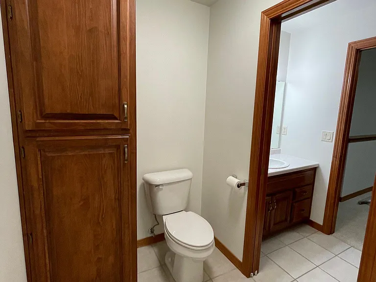 Upstairs bathroom, second linen closet.