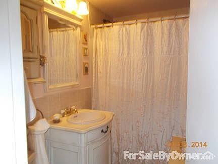 Downstairs full bathroom with tub
						:
						2-year old revised vent; vanity and floor