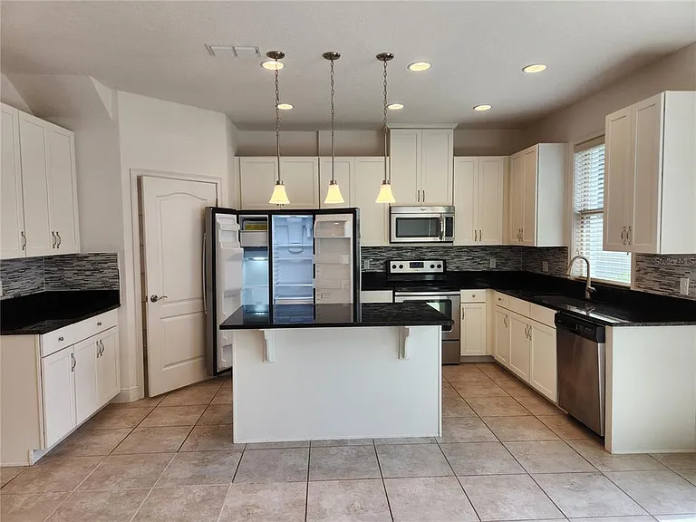 9805 Winnington St — Photo 13