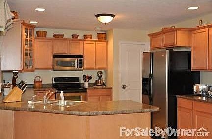 Kitchen
						:
						12x13.8 with ceramic tile, pantry and stainless steel appliances.