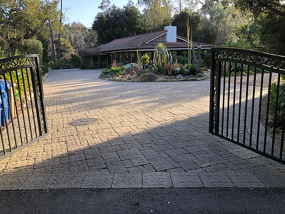 Gated entrance provides privacy and security for our property