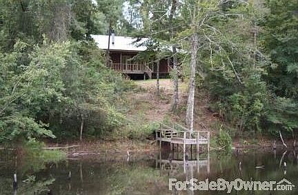 Rear view of main house from across pond