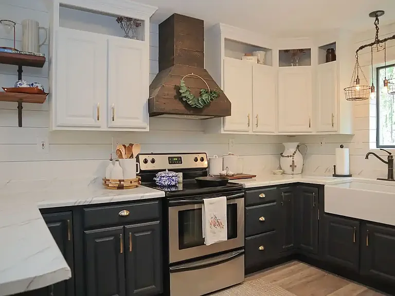 Kitchen with shiplap walls and farm sink