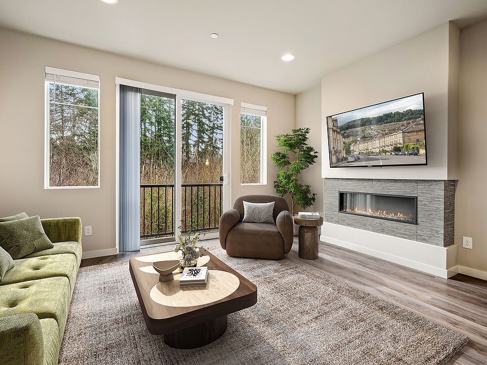 Large living room with greenbelt facing.