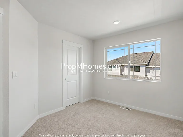 7527 NW Eleanor Ave — Photo 14