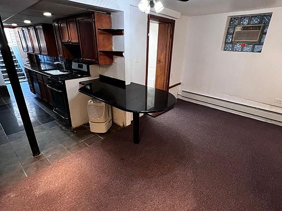 Living Room (facing kitchen & laundry room)