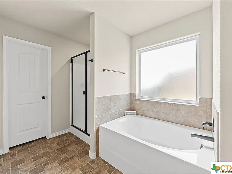 Master Bathroom (flooring in photo is old)