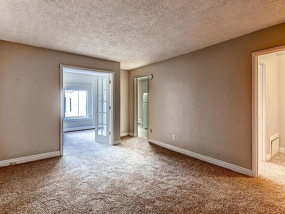 A Living Room at Fountainhead Apartments in Denver, CO