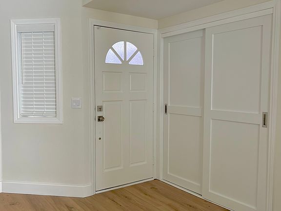 Front Entrance with Storage and Pantry Area.