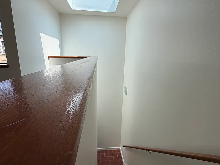 Looking down stairs to entryway