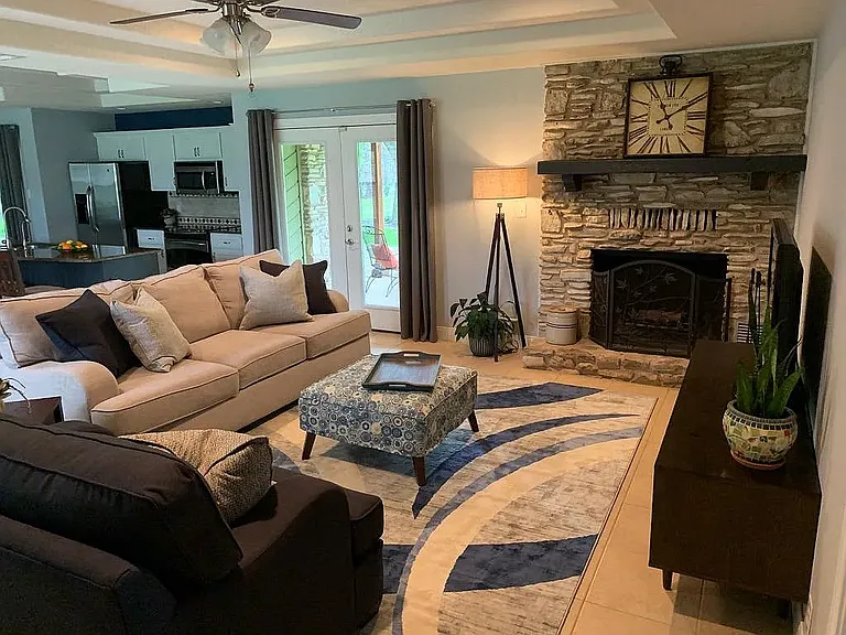 Living room with wood burning fireplace
