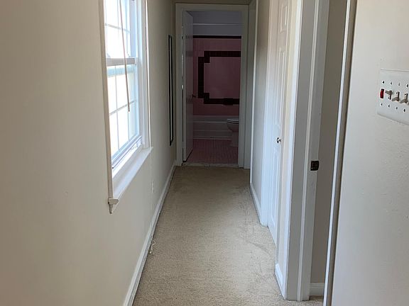 Hallway w/ linen closet (right)