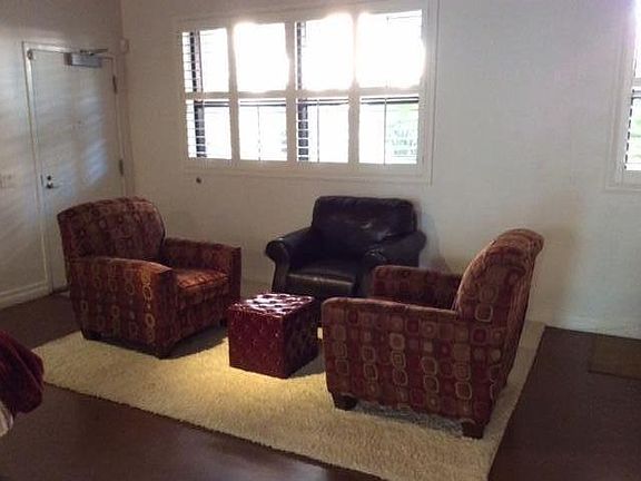 Conversation area overlooking shared outdoor/ entertainment